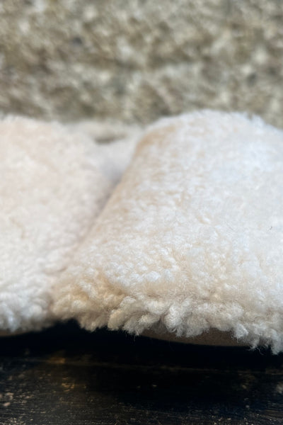 Chaussons en mouton retourné Off White